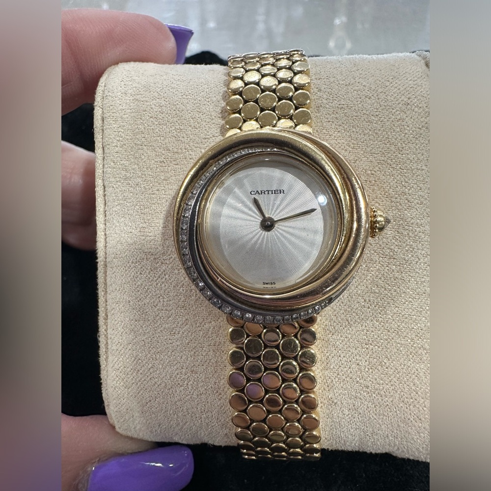 Cartier Trinity Watch in Solid 18k with original Diamonds on the Bezel.